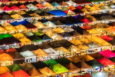 Multi colored umbrellas for sale in market