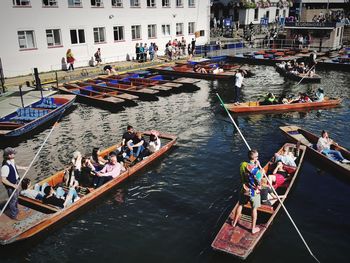 High angle view of people on boats in canal