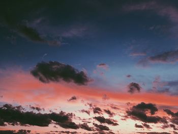 Scenic view of silhouette trees against sky at sunset