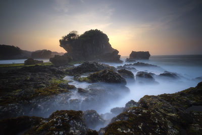 Scenic view of sea against sky during sunset