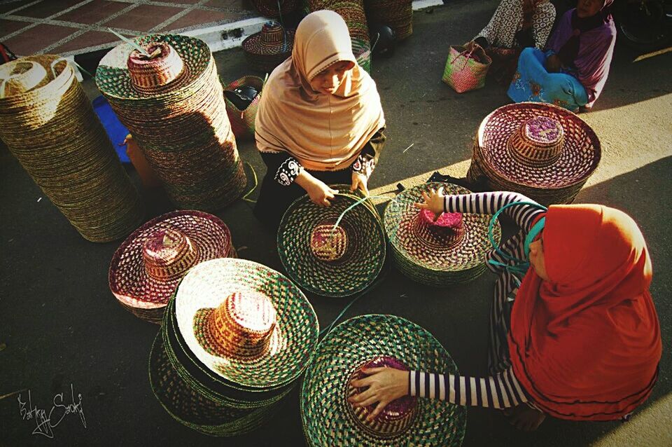 indoors, variation, high angle view, choice, still life, retail, large group of objects, for sale, arrangement, abundance, shoe, food and drink, multi colored, market, collection, table, market stall, side by side, display