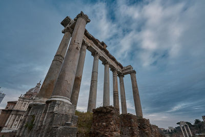 Low angle view of old temple against sky