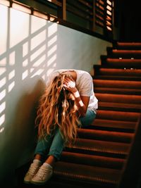 Young woman on steps