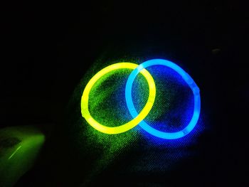 Multi colored light painting against black background