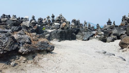 Stack of rocks against sky