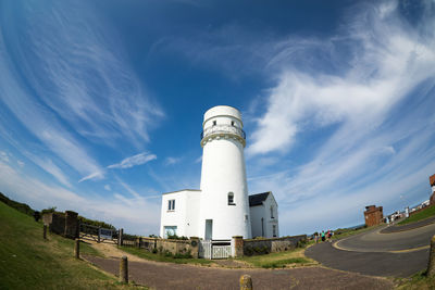 Low angle view of lighthouse against sky