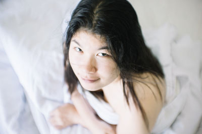 Portrait of cute girl in bed