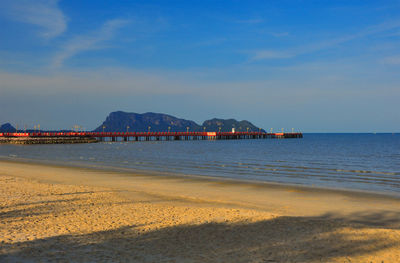 Red bridge that extends to the sea, saran withi bridge in prachuap khiri khan province, thailand.
