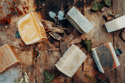 Making handmade natural soaps on an old wooden table