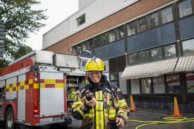 Firefighter talking via walkie talkie