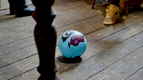 Close-up of ball on hardwood floor