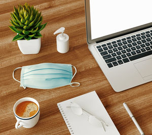 High angle view of coffee cup on table