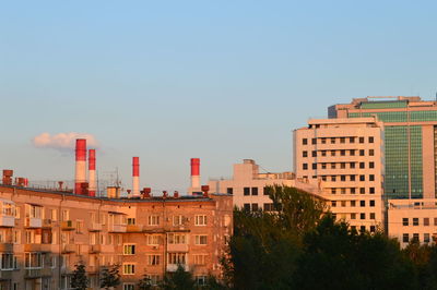 Buildings against clear sky