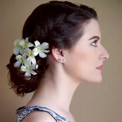 Close-up of beautiful young woman against white background