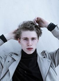 Portrait of a young man standing outdoors