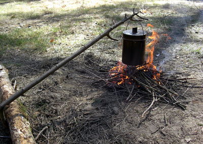 High angle view of fire on metal