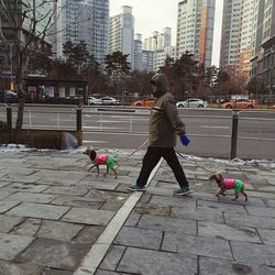 Woman walking on city street