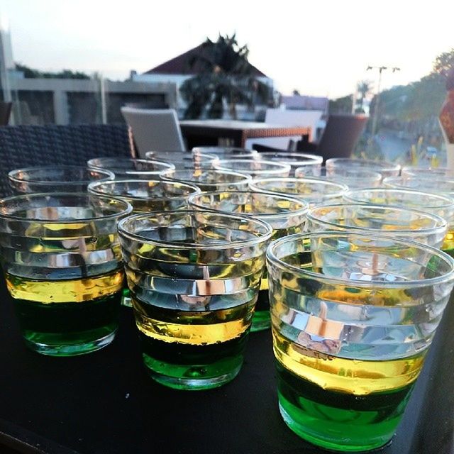 food and drink, drink, refreshment, drinking glass, still life, table, glass - material, side by side, alcohol, transparent, in a row, arrangement, freshness, close-up, focus on foreground, no people, day, variation, jar, choice