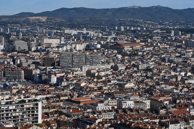 High angle view of illuminated buildings in city