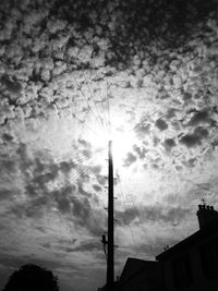 Low angle view of built structure against cloudy sky