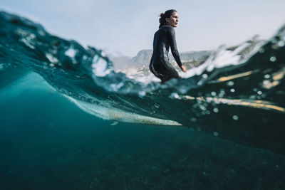 Man swimming in sea