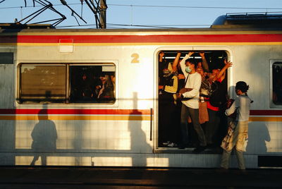 People standing in train