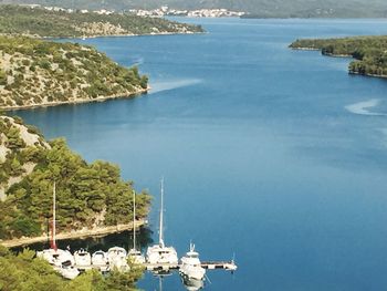 Boats moored in sea