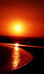 Sun shining over sea