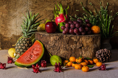 Still life with group of fruits on the timber