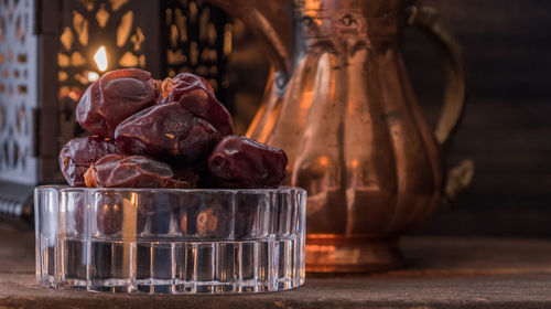 Close-up of glass jar on table