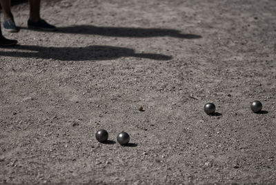 High angle view of petanque balls on ground