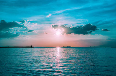 Scenic view of sea against sky during sunset