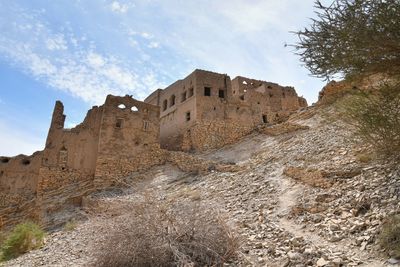 Low angle view of fort against sky