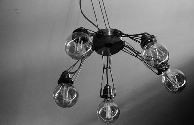Close-up of light bulb hanging