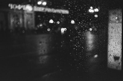Close-up of raindrops on glass window