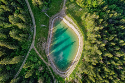 Aerial view of a small lake at les gets, a resort ski station in the french alps