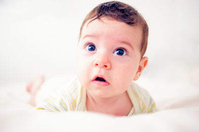 Cute baby boy on bed