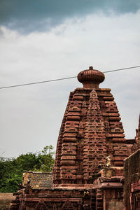 Low angle view of temple building against sky