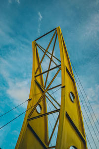 Low angle view of yellow bridge 