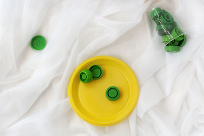 High angle view of plastic toy on bed