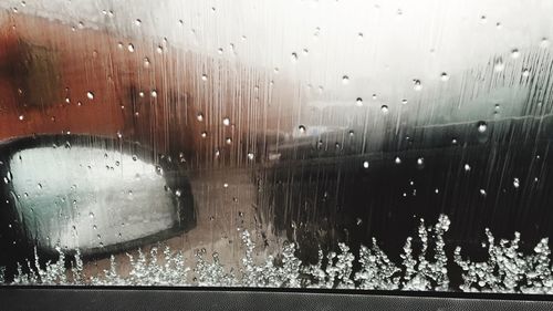 Full frame shot of wet window in rainy season