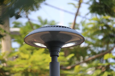 Low angle view of street light against sky