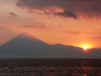 View of calm sea at sunset