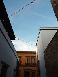 Low angle view of buildings against sky