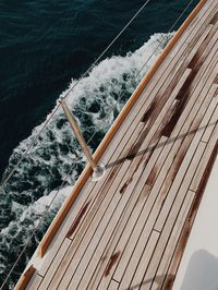 Low angle view of ship on sea against sky