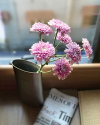 Close-up of flower vase on table