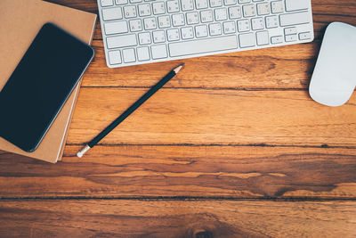 High angle view of mobile phone on table