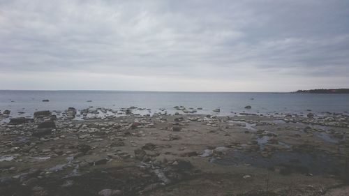 Scenic view of beach against sky