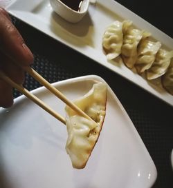 Close-up of person preparing food