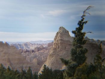 Scenic view of rocky mountains against sky